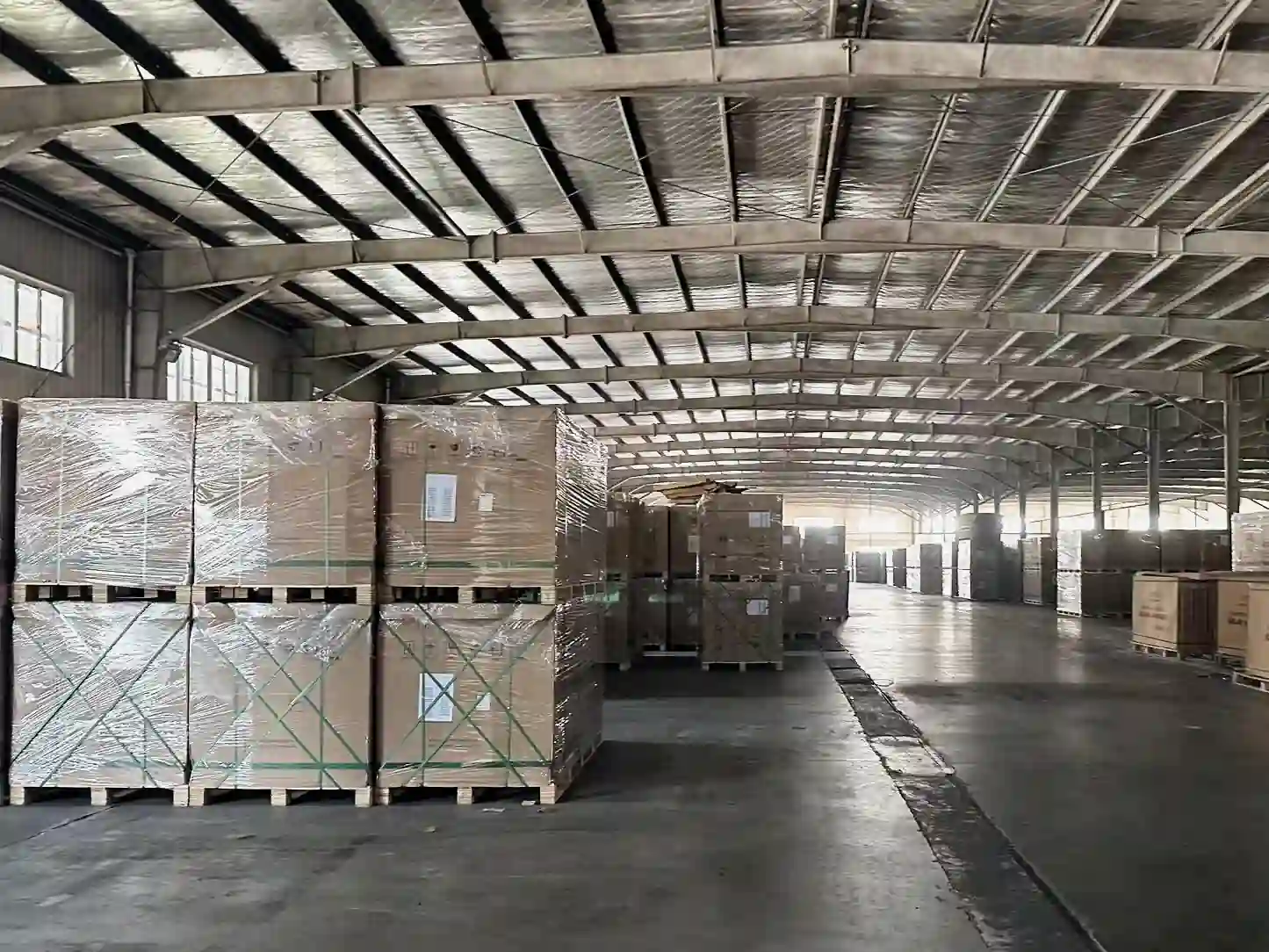 Packed solar panels stored in factory warehouse ready for shipment